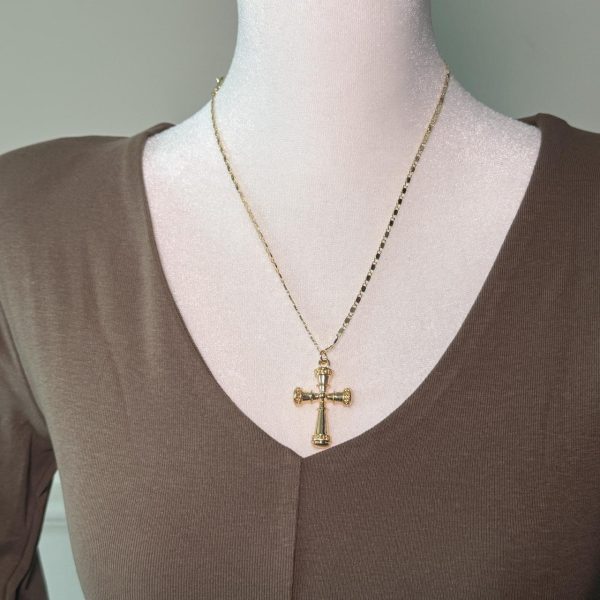 Gold tone cross pendant necklace